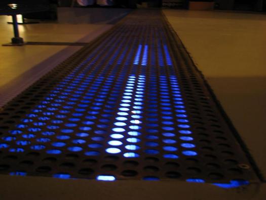 Walking perforated sheet, neon integrated
